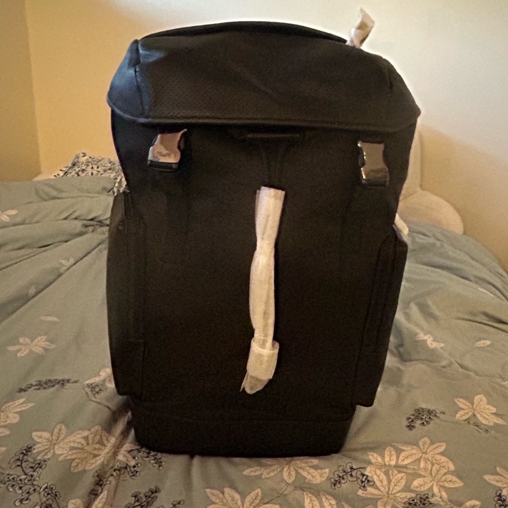 Black leather coach backpack